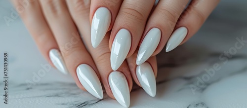 Elegant hand of beautiful woman with glamorous white manicure, feminine and sophisticated beauty concept photo
