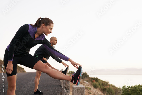 Mountain, stretching and woman with man for fitness, workout coach or help for healthy body. Exercise, wellness and girl runner with personal trainer in muscle warm up for outdoor morning training.