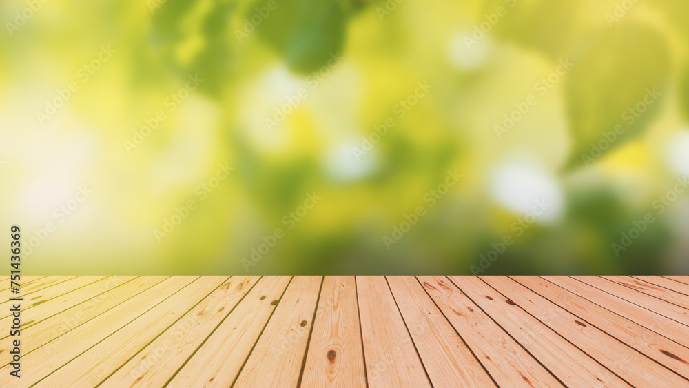 Wood floor with blurred trees of nature park background and summer season. Product display template.