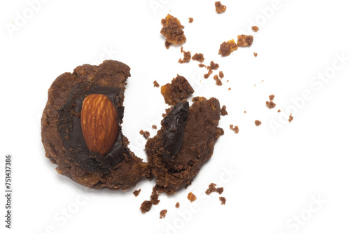 Crashed of afghan cookies made from chocolate and cornflakes with almond on top with crumble isolated on white background clipping path