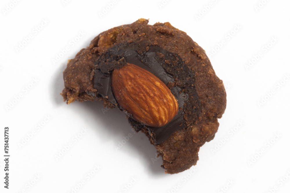 Broken of afghan cookies made from chocolate and cornflakes with almond on top isolated on white background clipping path Broken of afghan cookies made from chocolate and cornflakes with almond on top isolated on white background clipping path