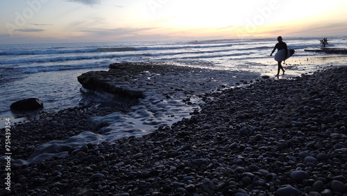 Southern California beaches, sunsets, surfers, tide pools and palms trees at Swamis Reef Surf Park and Moonlight Beach in Encinitas California.