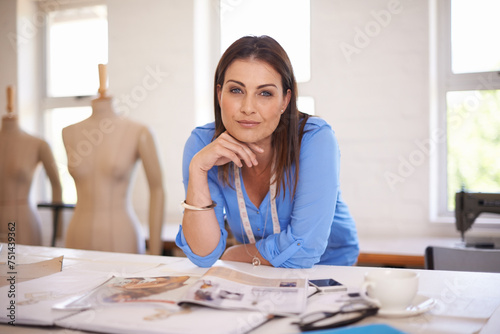 Business woman, portrait and fashion designer in a creative office with stylist and seamstress. Professional, style and female person at a design company with art director ready for working at job