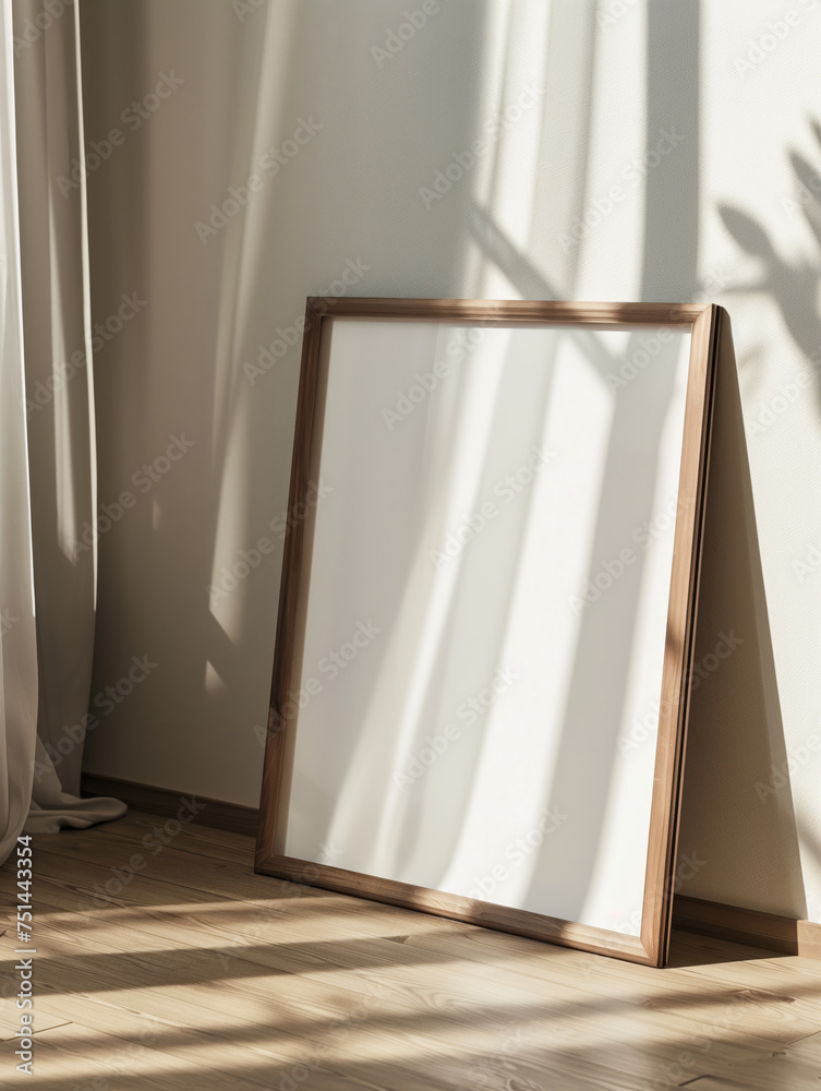 Mockup painting standing on the floor in a white beautiful interior with window shade and dried flowers in a large modern vase Mockup painting standing on the floor in a white beautiful interior with window shade and dried flowers in a large modern vase