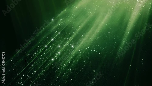 Luminous green particles and beams of light creating a sparkling bokeh effect, suitable for concepts of magic, wonder, or festive St Patricks Day backgrounds photo