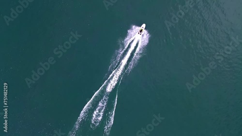 Aerial view jet ski in sea. white water and splashes in sea water. Fast speed jet ski.