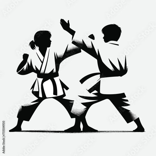Two children are fighting karate 