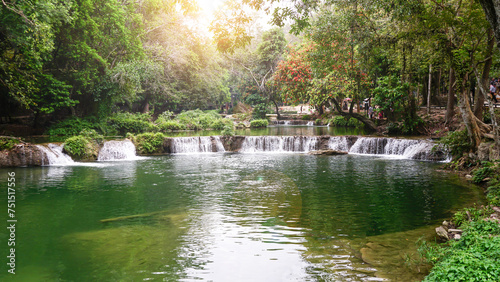 Waterfalls with trees, plants and sunlight in the forest, Namtok Chet Sao Noi National Park view in Saraburi Province, Thailand. Travel concept. photo