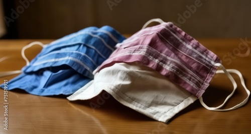  Colorful folded cloth napkins on wooden table