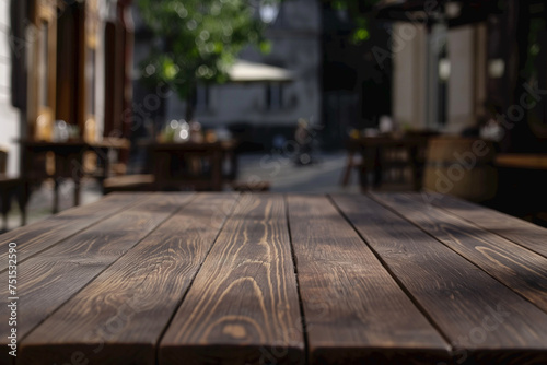 Empty wooden table and Coffee shop blur background