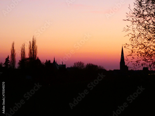 Beautiful Sunset in Rostock Riekdahl, view of the church "Petrikirche" © Treegarden Photos