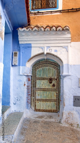 Wooden doorway in the medina, in Chefchaouen, Morocco © Angela