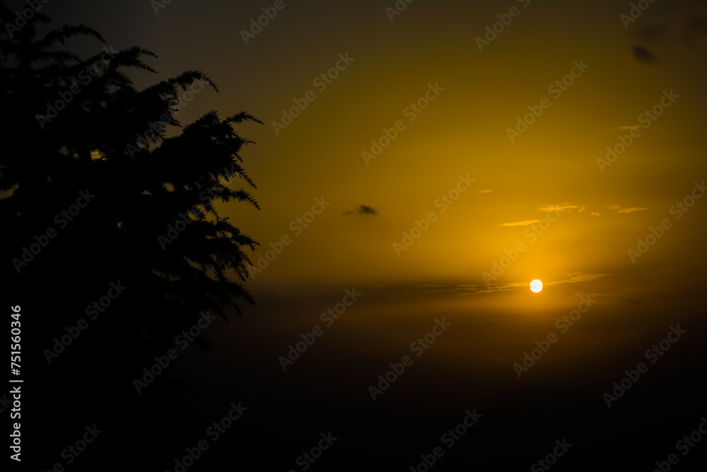 Sunset view from the mountains of Lansdowne. Mountain Sunset view in Lansdowne. Amazing golden sunset seen through forest drive, Lansdowne Uttarakhand.