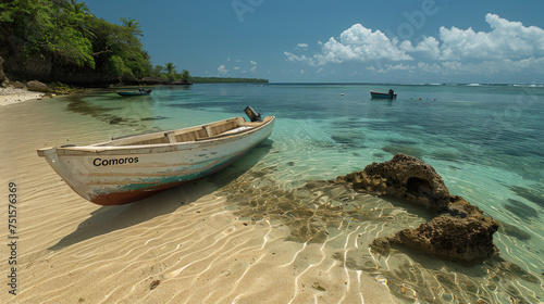 Boat on a tropical beach in Comoros. photo