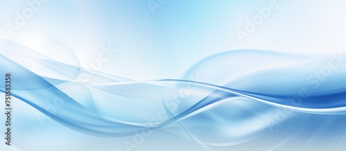 A blue and white abstract background featuring waves in a soft and blurry focus, creating a dynamic and fluid visual effect. The waves appear to be gently flowing across the canvas, adding movement