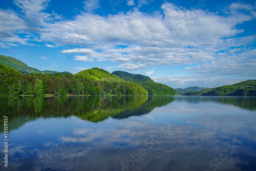 Fototapeta Naklejka Na Ścianę i Meble -  Beautiful landscape of Izvorul Muntelui dam lake at the hydroelectric dam in Transylvania. A view of Bicaz Dam in Romanian Carpathians, Europe	