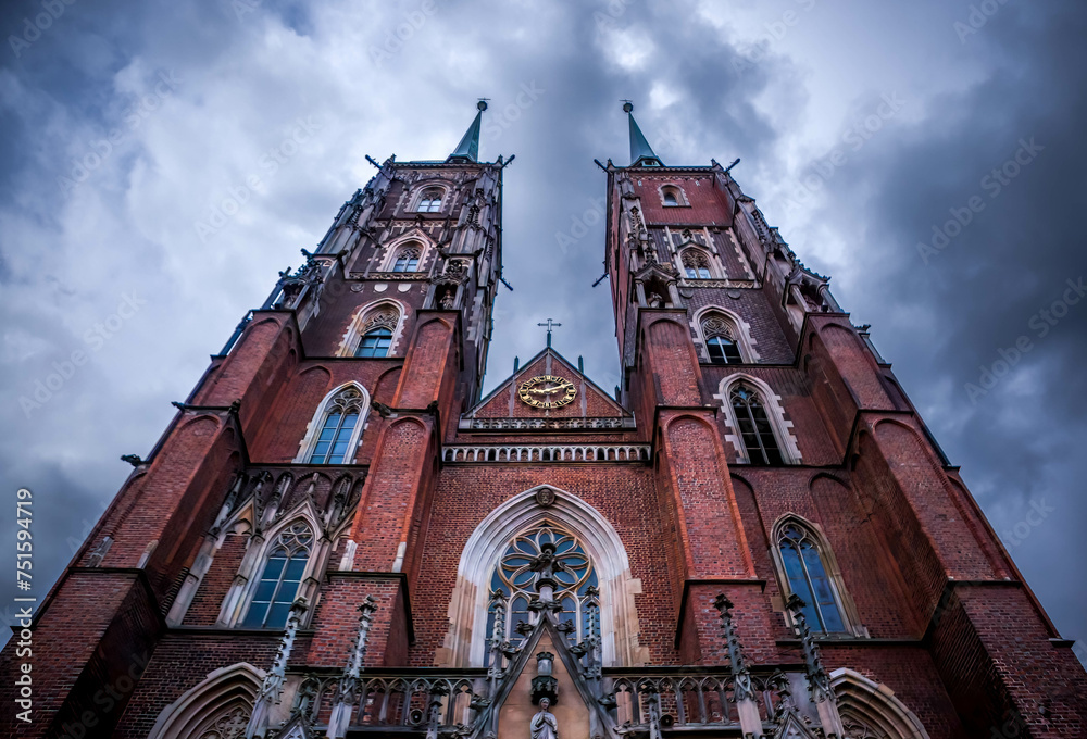 Cathedral of St. John the Baptist at Ostrow Tumski with drammatic sky in Wroclaw.
