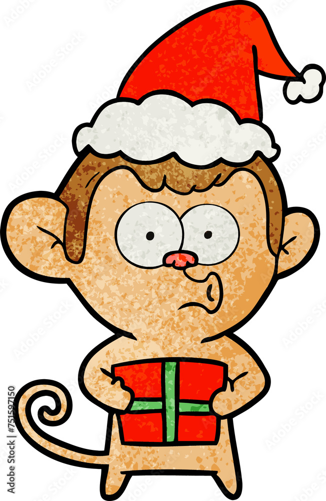 Naklejka premium textured cartoon of a christmas monkey wearing santa hat