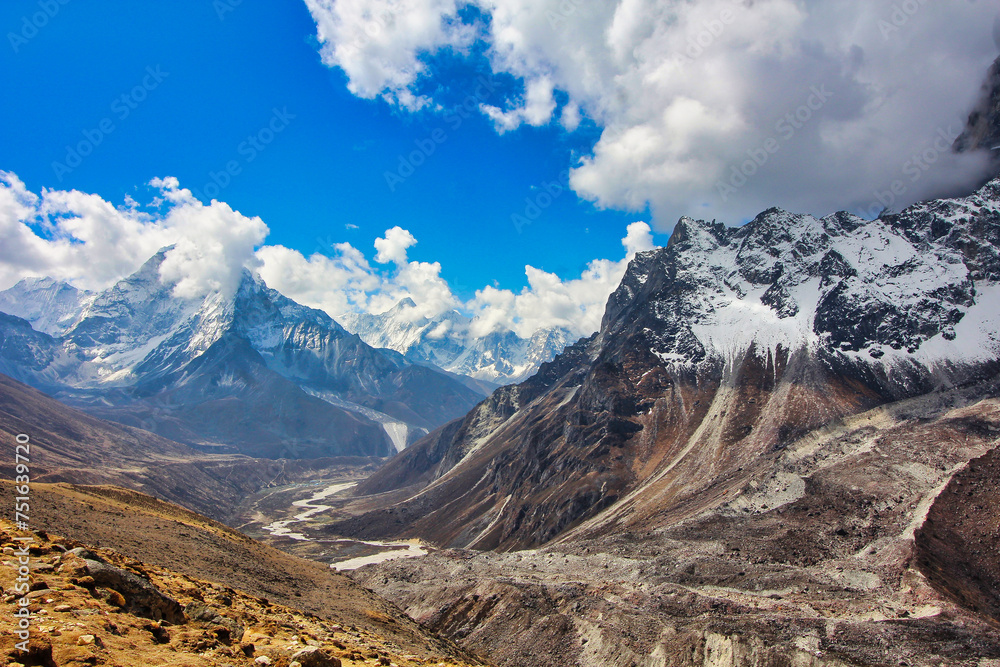 Stunning View of Ama Dablam rising dramatically over the Khumbu glacier and valley from this view near Periche village in Nepal