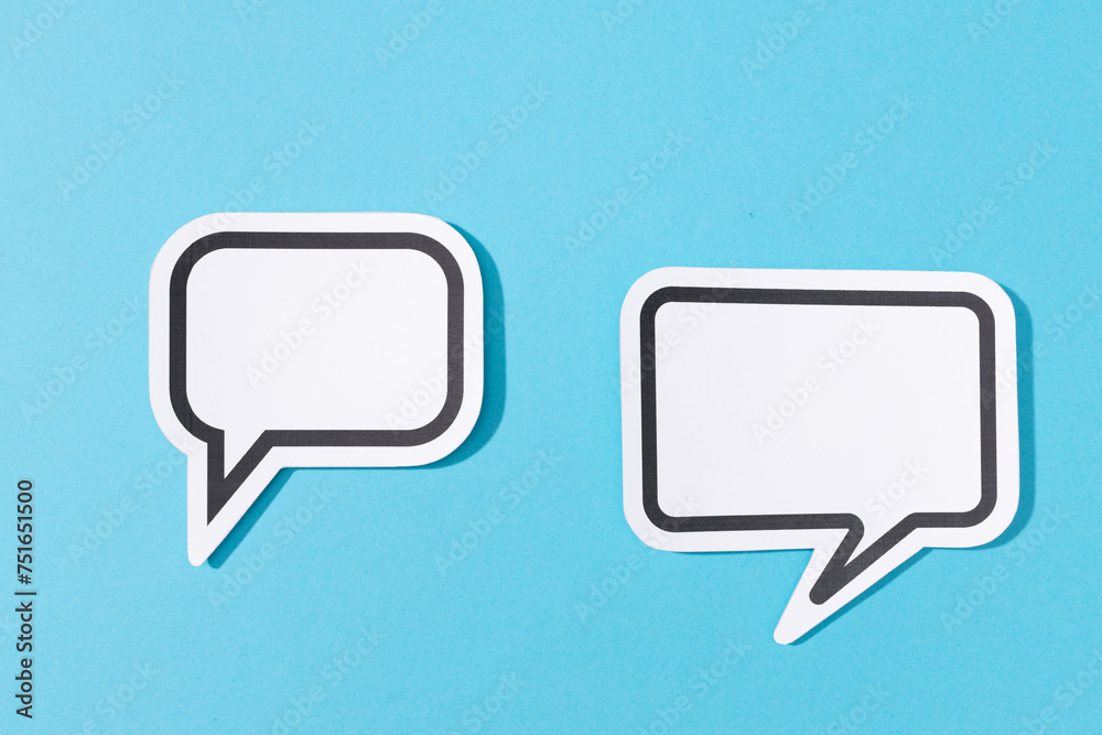 Two Blank Speech Bubble isolated on blue background. Mock up template