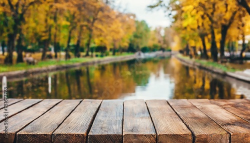 wooden table on the background of the autumn park