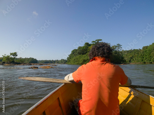Amerindian directing boat