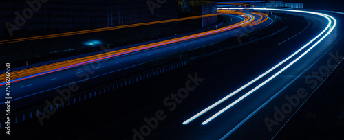 lights of cars driving at night. long exposure