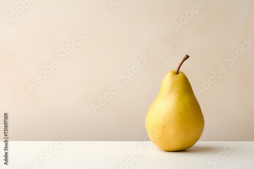 Juicy pear on a plain surface
