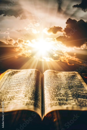 An inspiring image of an open bible with mountainous sunrise in the background, illustrating new beginnings