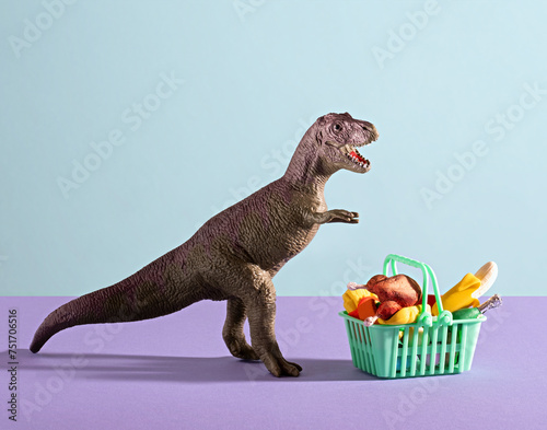 Dinosaur with shopping cart full of food on blue and violet background. Food shopping concept.