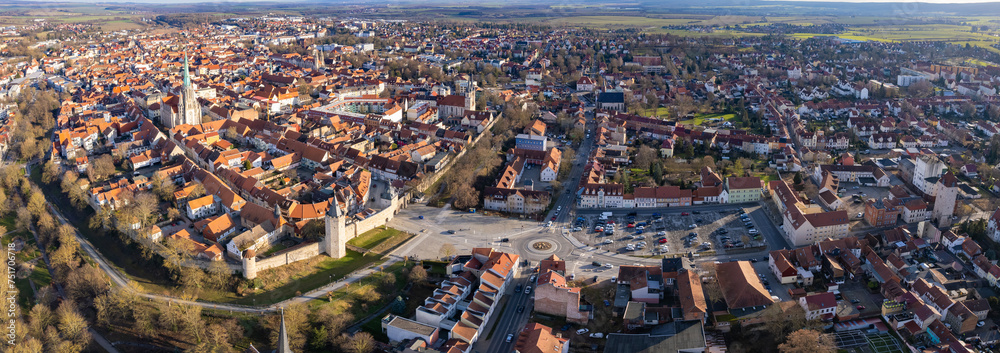 Aerial around the old town of Mühlhausen in Germany, Thuringia on a sunny afternoon in autumn	
