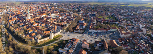 Aerial around the old town of Mühlhausen in Germany, Thuringia on a sunny afternoon in autumn 