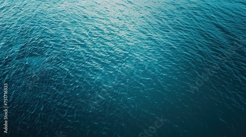 Blue water surface as a background. Texture of blue water surface.