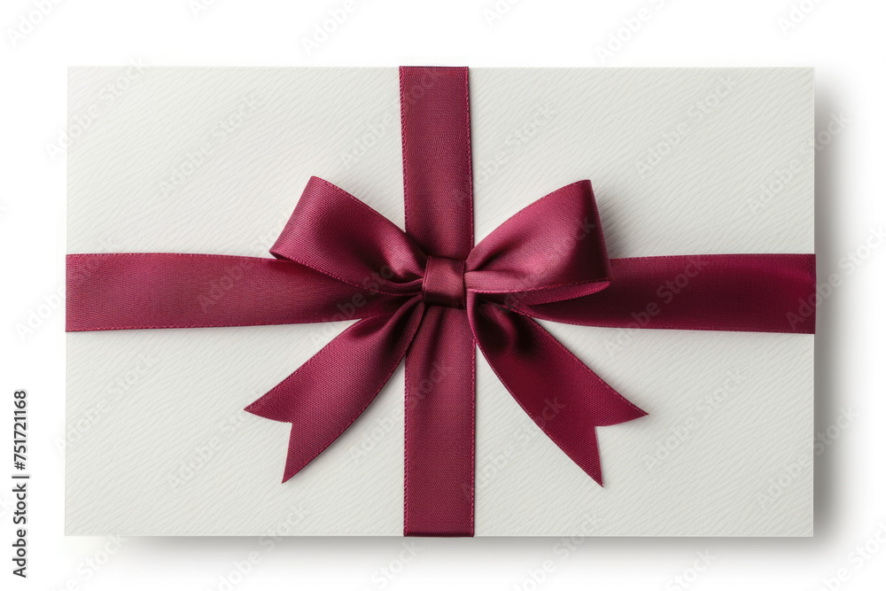 A blank gift card with a luxurious red ribbon A blank gift card with a luxurious red ribbon
