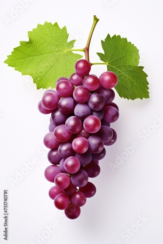 close up of a grape with grape leaves isolated on a white background