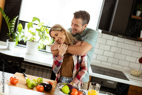 Man and woman share a warm ...