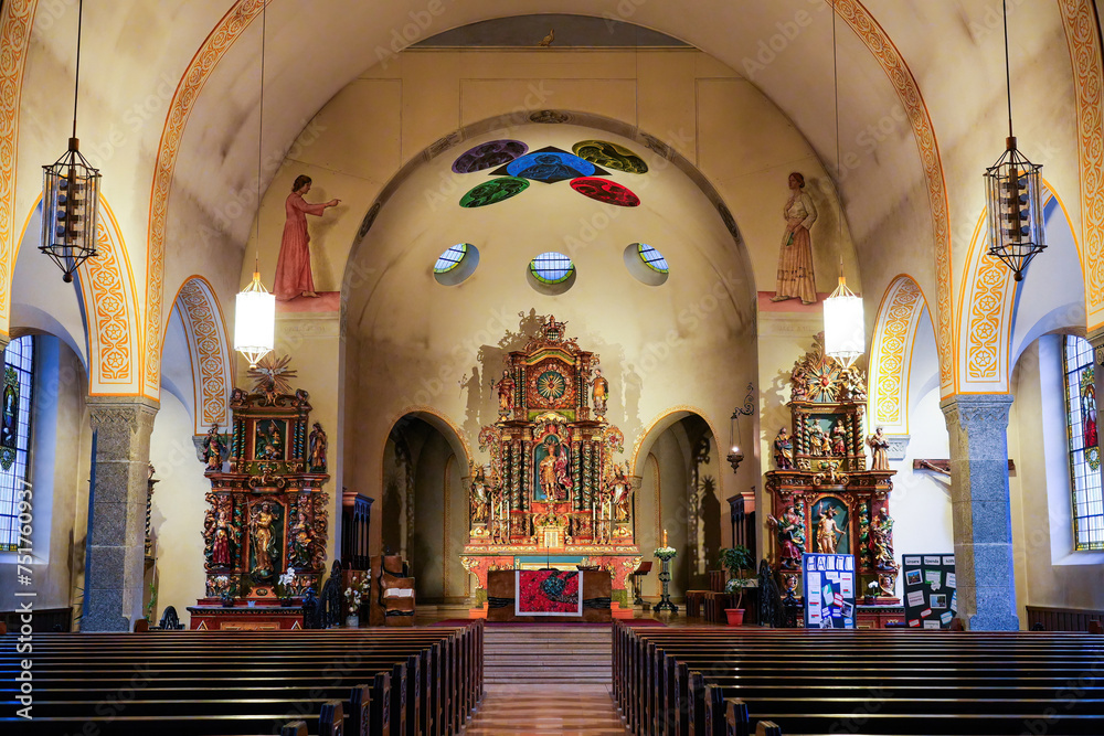 Fototapeta premium Central aisle of the Pfarrkirche (parish church) of St. Mauritius in the village of Zermatt in the Swiss Alps, Canton of Valais - Religious building in Switzerland