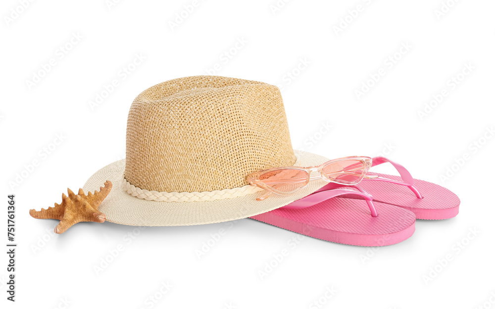 Stylish beach hat, flip flops and starfish on white background Stylish beach hat, flip flops and starfish on white background