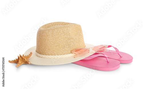 Stylish beach hat, flip flops and starfish on white background