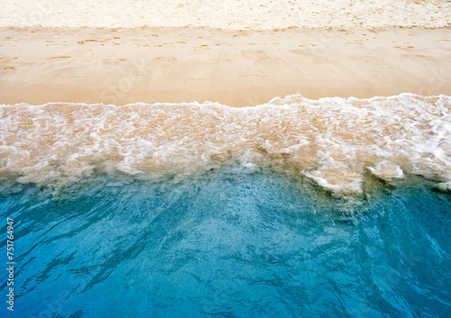 Blue ocean wave or clear sea with sandy beach, summer concept background © Alex