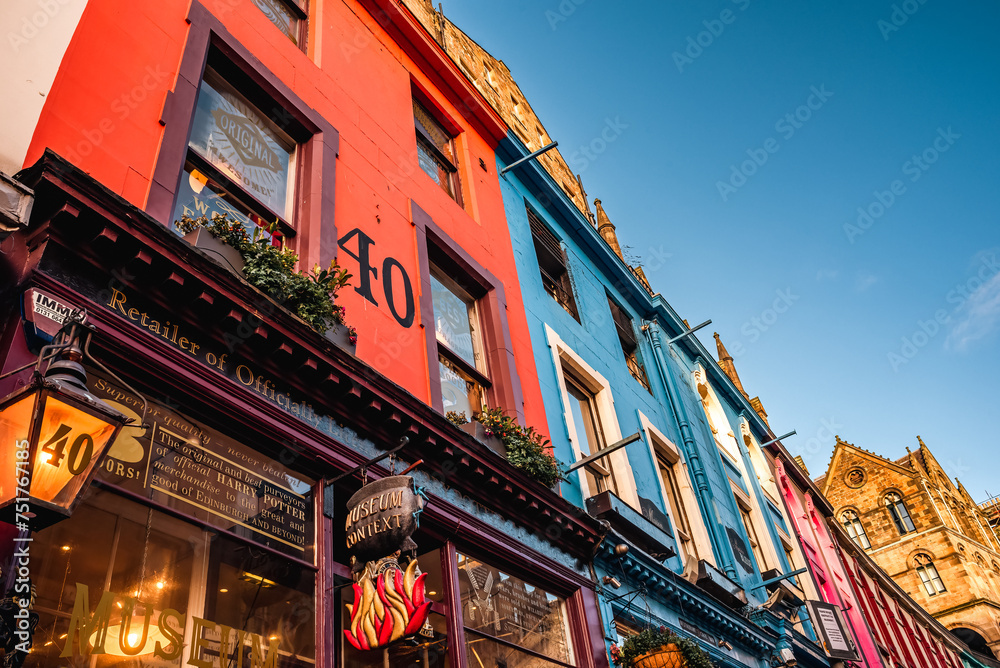 Fototapeta premium Edinburgh, Scotland - January 22nd, 2024: the red facade of Museum Context, a Harry Potter-themed museum located on West Bow and Victoria Street in Edinburgh Old Town