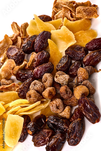 Healthy snack: mixed dried fruits, dried mango, dates, figs, dried persimmon, Close-up