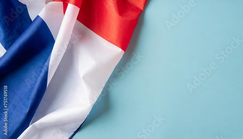 celebration concept for france s bastille day holiday top view flat lay of french flag on pastel blue background with empty space for advert or message