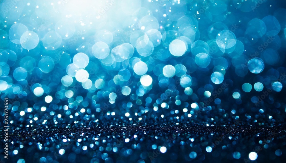 blurred abstract blue bokeh background with defocused lights and stars