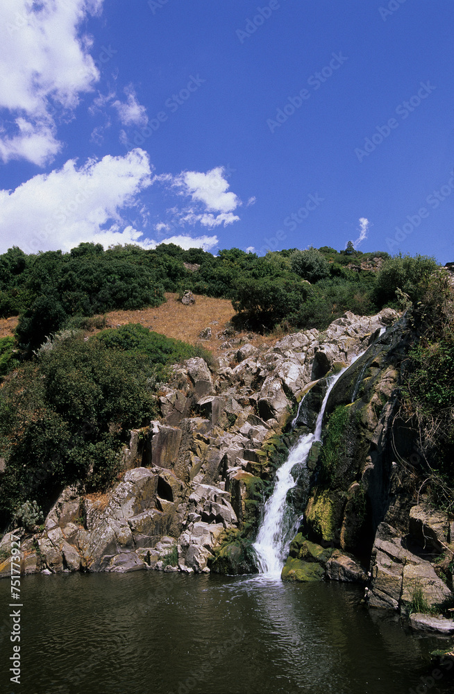 waterfall in the mountains, Rio Triulintas waterfall. Martis (Sassari), Sardinia. Italy