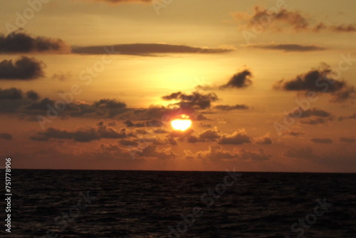 sunset at sea with clouds