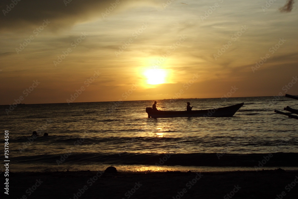 Fototapeta premium sunset with boat