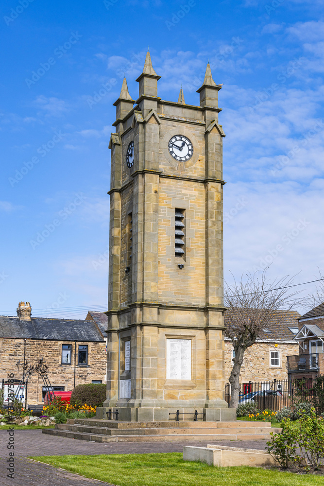 Clock tower in a square in Amble.