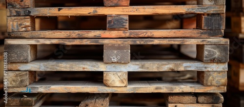 Neatly stacked wooden pallets for industrial storage and transportation purposes