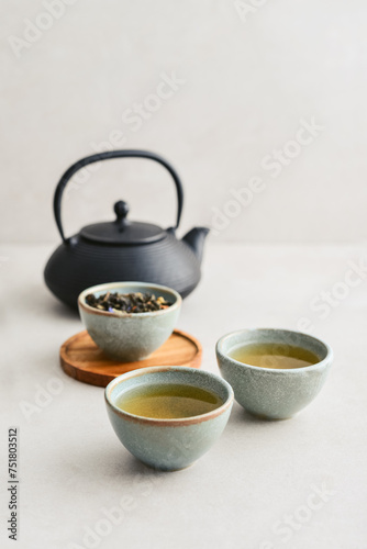 two ceramic cups of green tea